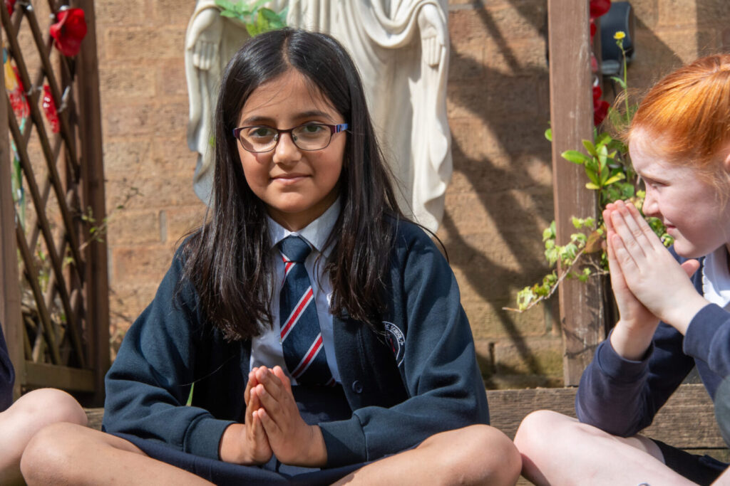 a picture of students praying