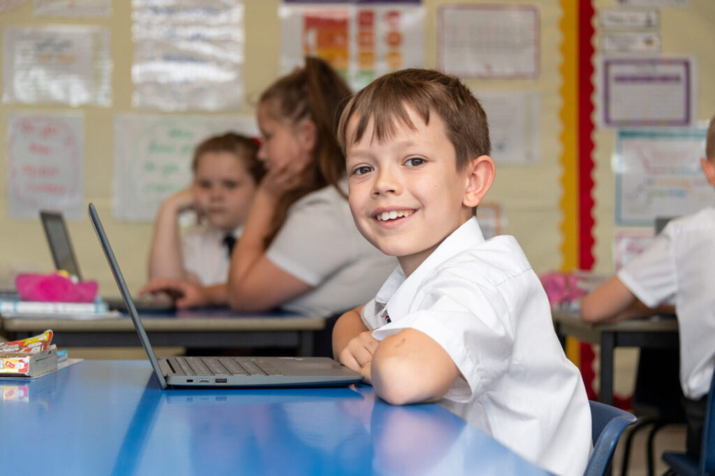 a picture of a student with a laptop